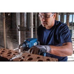 FURADEIRA DE IMPACTO 600 W 1/2 TRAMONTINA PARA USO PROFISSIONAL EMPUNHADURA AUX. VELOCIDADE VARIÁVEL E SISTEMA DE REVERSÃO